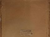 an old picture of a brown box with a label on it