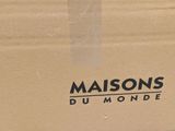 a brown box with a logo on it that says maisons du monde