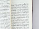 an open book that is sitting on a table