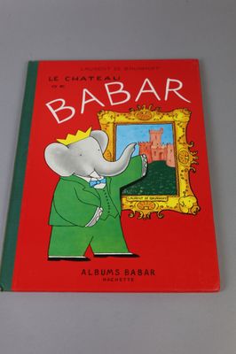 the book is red with a picture of an elephant in a green suit