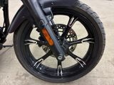 a close up of a motorcycle tire on the street