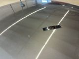 a remote control sitting on the top of a car