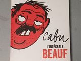 a close up of a book with a cartoon face on it