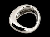 a silver ring on a black background with a black background
