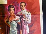 an old movie poster of a man and a woman standing next to each other