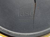 an image of a close up of a pan with a crack in it