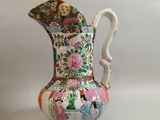 a vase that is sitting on a white table