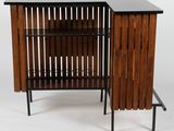an image of a wooden cabinet with a black top