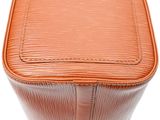 a close up of a brown leather case on a white background