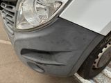 a close up of a car ' s headlight and front bumper