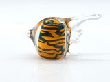a glass vase that has a tiger print design on it