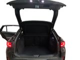 the back of a car with its trunk open showing the rear end