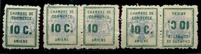 a close up of a group of five different types of money