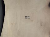 an image of a close up of a metal object with numbers on it