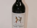 a bottle of wine that is sitting on a table