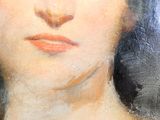 tableau représentant le visage d'une femme aux yeux bleus et aux cheveux bruns
