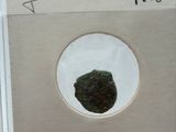 a picture of a picture of a rock in a glass case
