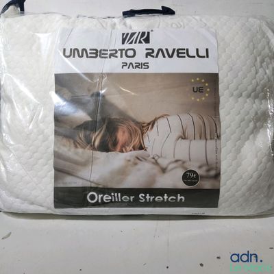 a picture of a pillow that has a picture of a woman sleeping on it