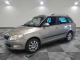 a picture of a silver car parked in a garage