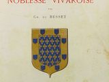 an old book with a coat of arms and a shield on it