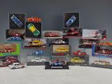 a lot of toy cars that are in a display case