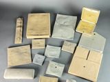 many different types of wallets laid out on a table
