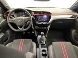 the interior of a car with a steering wheel, dashboard, and dashboard lights