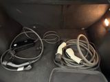 wires and cords in the trunk of a car