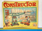 two children playing with a construction set on the table