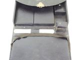 a small black box with a wallet inside of it