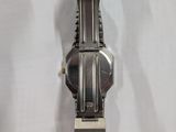an image of a wrist watch hanging on a wall