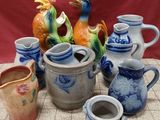 many different types of vases sitting on a table