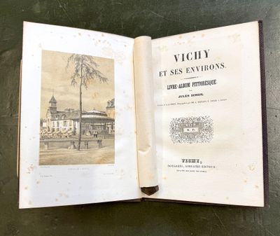 an open book with a picture of a building on it