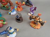 many figurines of different types and sizes on the table