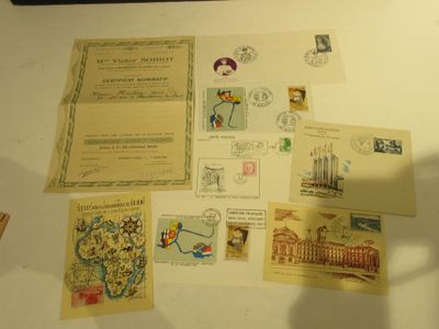 a lot of stamps and postcards on the table