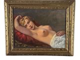 une image représentant un tableau où l'on voit une femme allongée sur un canapé rouge