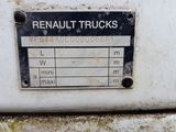 two signs on the side of a truck that says renault trucks