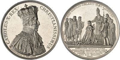 a close up of a coin with a crown on top of it