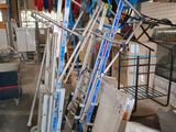 a lot of hoses that are sitting on a cart