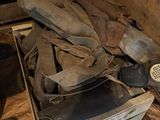 a pile of shoes that are on the floor