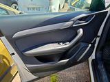 a car door open with the driver ' s side door open