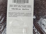 a label on the back of a jacket that says