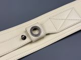 a white belt with a metal buckle on it