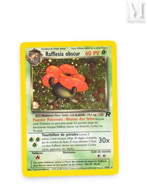 a close up of a pokemon card on a white surface