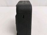 an image of a black camera case sitting on a table