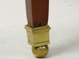an image of a close up of the legs of a wooden table