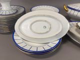 a lot of plates that are sitting on a table