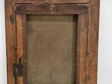 an old wooden picture frame with a brown linen backing and a brown canvas backing