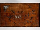 an image of a wooden box with a design on it