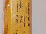a yellow box with a red label on it